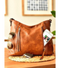 Georgias Tidløse Elegance | Vintage Skuldertaske